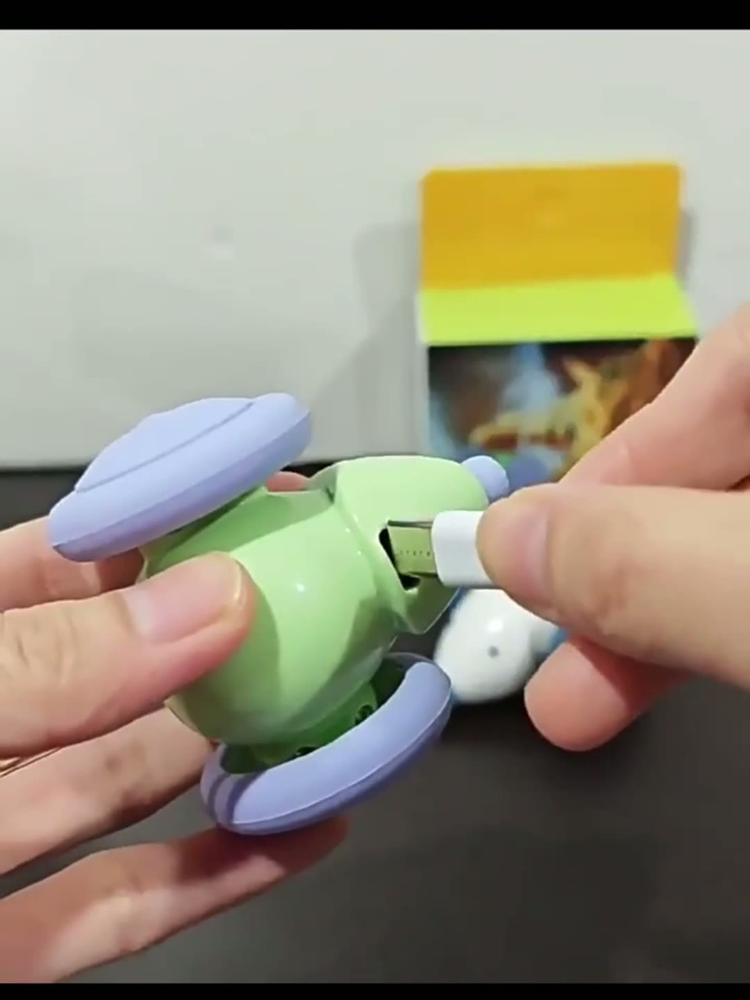 Indoor tabby cat pouncing on the PawPulse robotic mouse toy